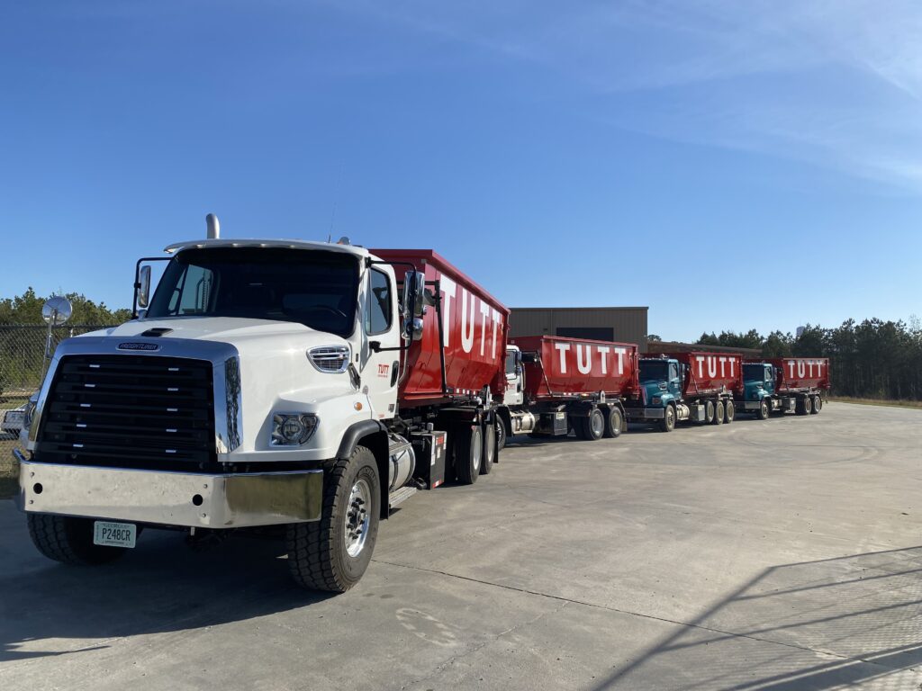 Tutt Contracting team and equipment providing dumpster rental and recycling services across Grovetown, Augusta, and the CSRA