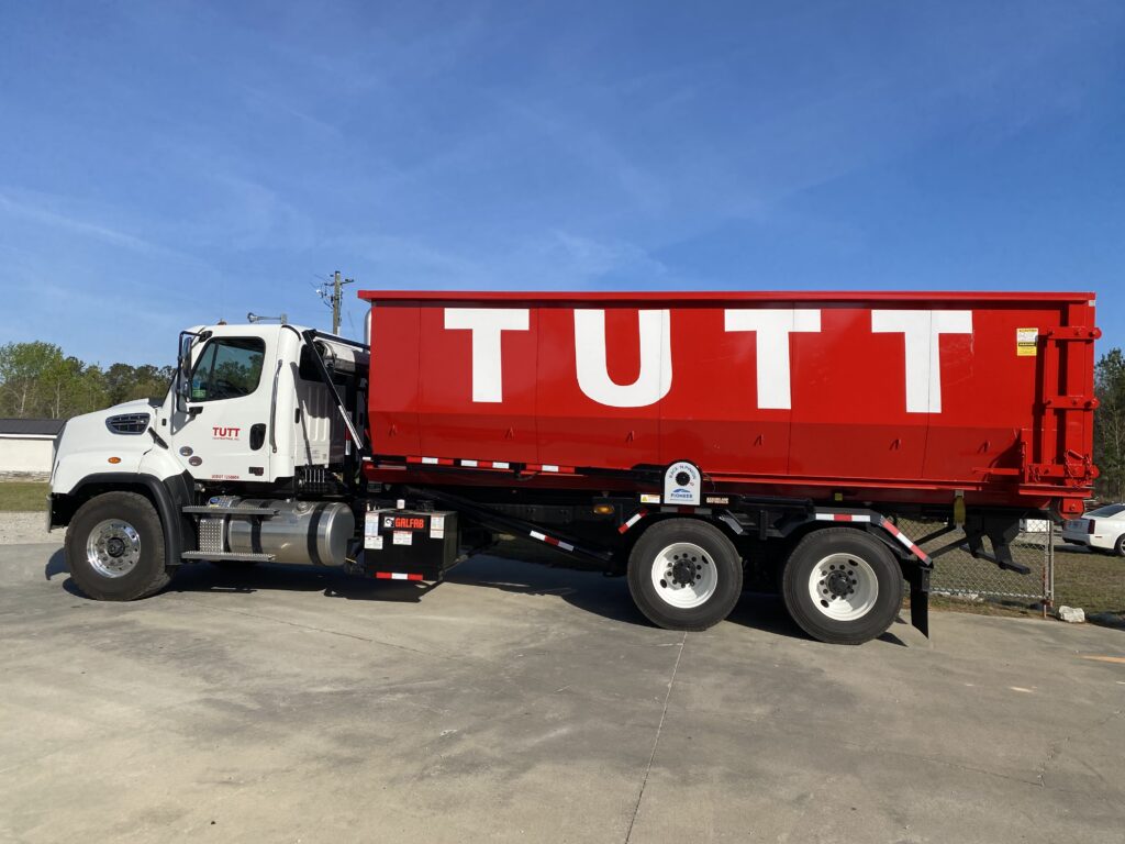 Tutt Contracting team and equipment providing dumpster rental and recycling services across Grovetown, Augusta, and the CSRA