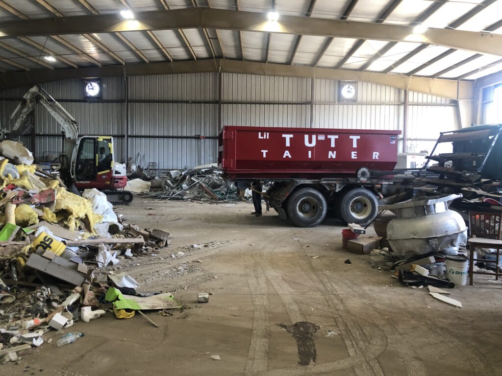 Tutt Contracting team and equipment providing dumpster rental and recycling services across Grovetown, Augusta, and the CSRA