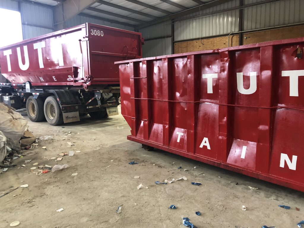 Tutt Contracting team and equipment providing dumpster rental and recycling services across Grovetown, Augusta, and the CSRA